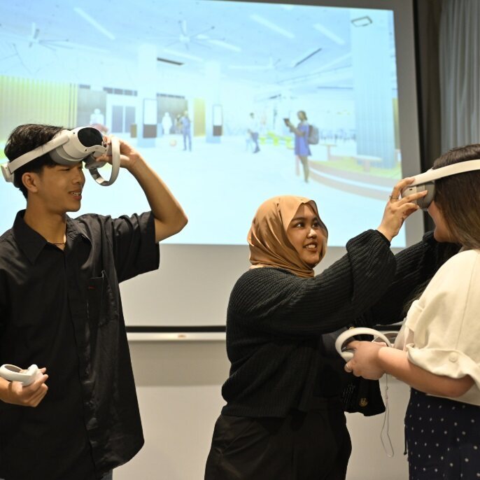 Students interacting with VR