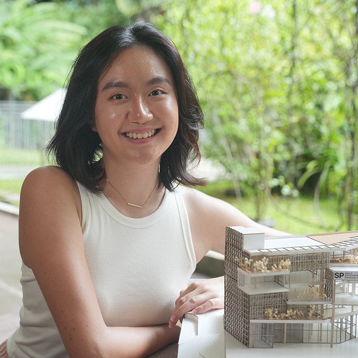 Girl posing with her architecture structure