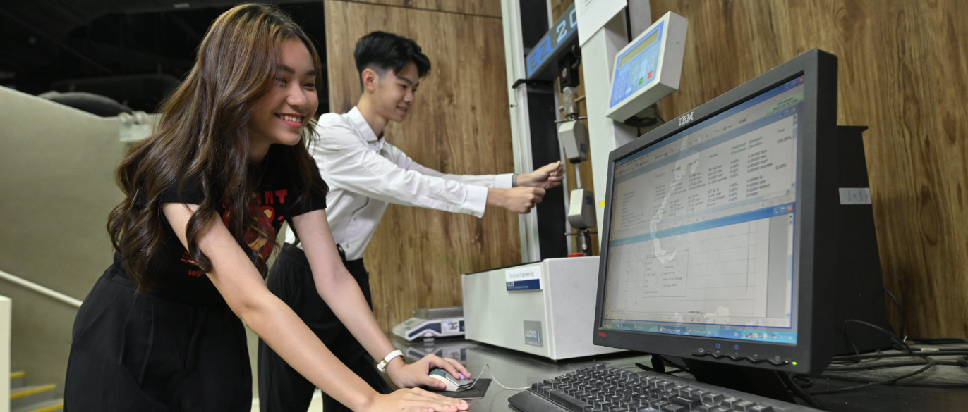 ABE-DCE Students Using Laptop and Machine