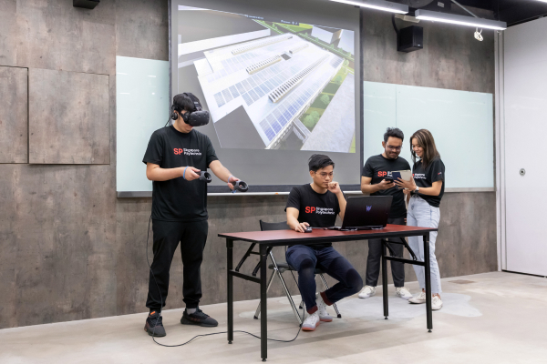 Students with VR interacting in a room