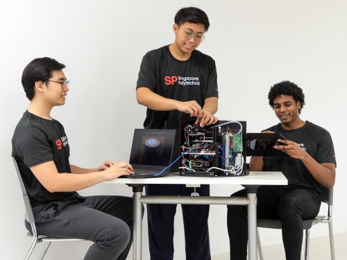 Students working on the automatic Pour-over Coffee Machine