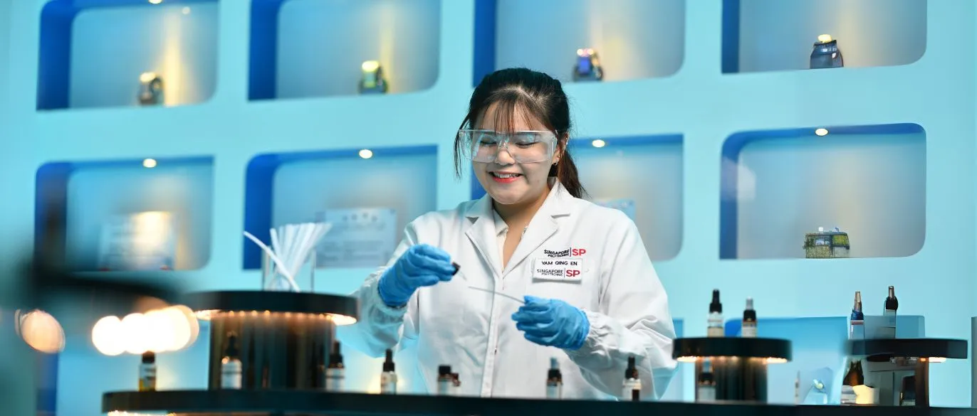 student in perfumery lab