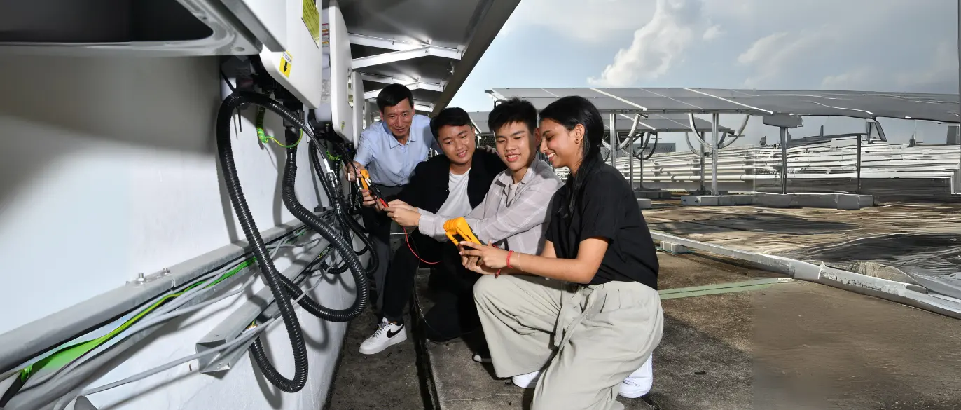 Students testing solar panel