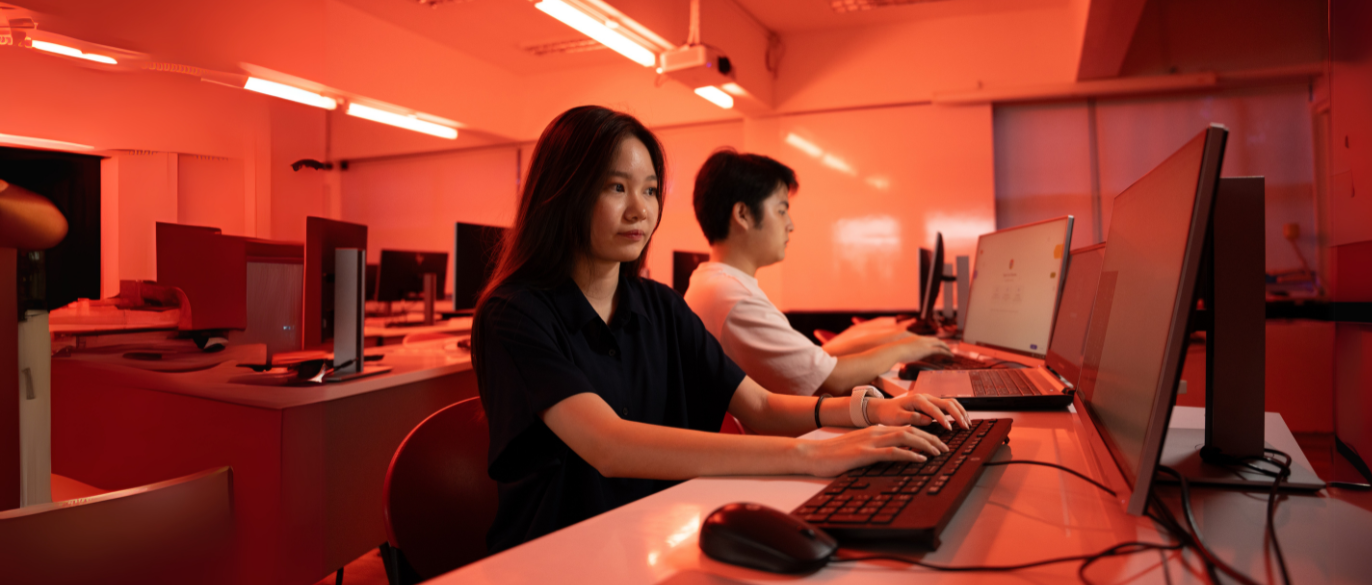 Students interacting with a computer