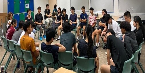 Students sitting around in a group