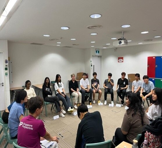 Students sitting around in a circle