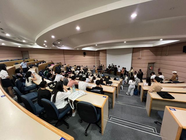 Students seated in a seminar room