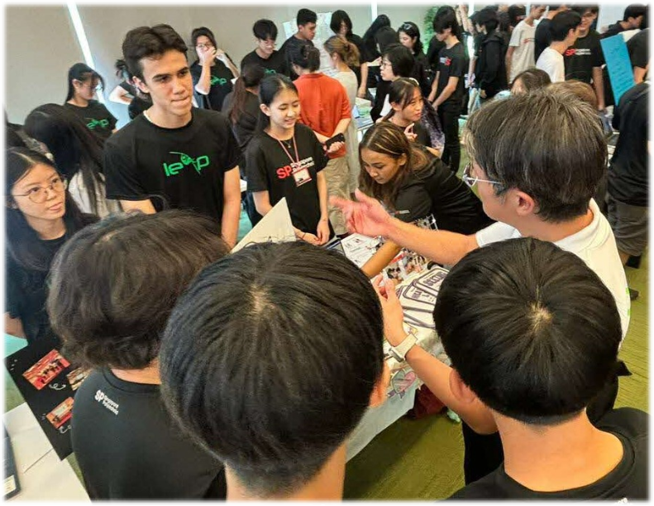 Students at a booth