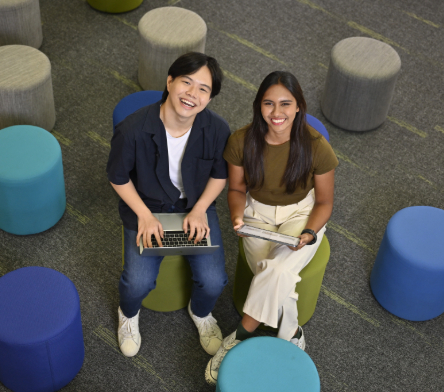 SB-DHRMP Picture of 2 Students on Round Chairs-v01