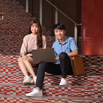 SOC-SOC Landing Picture of 2 Students on Stairs at SOC-v01